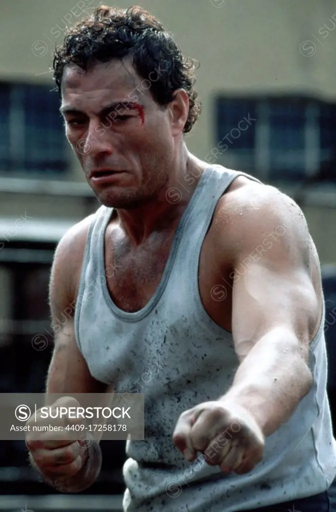 JEAN-CLAUDE VAN DAMME in IN HELL (2003), directed by RINGO LAM. Copyright: Editorial use only. No merchandising or book covers. This is a publicly distributed handout. Access rights only, no license of copyright provided. Only to be reproduced in conjunction with promotion of this film.