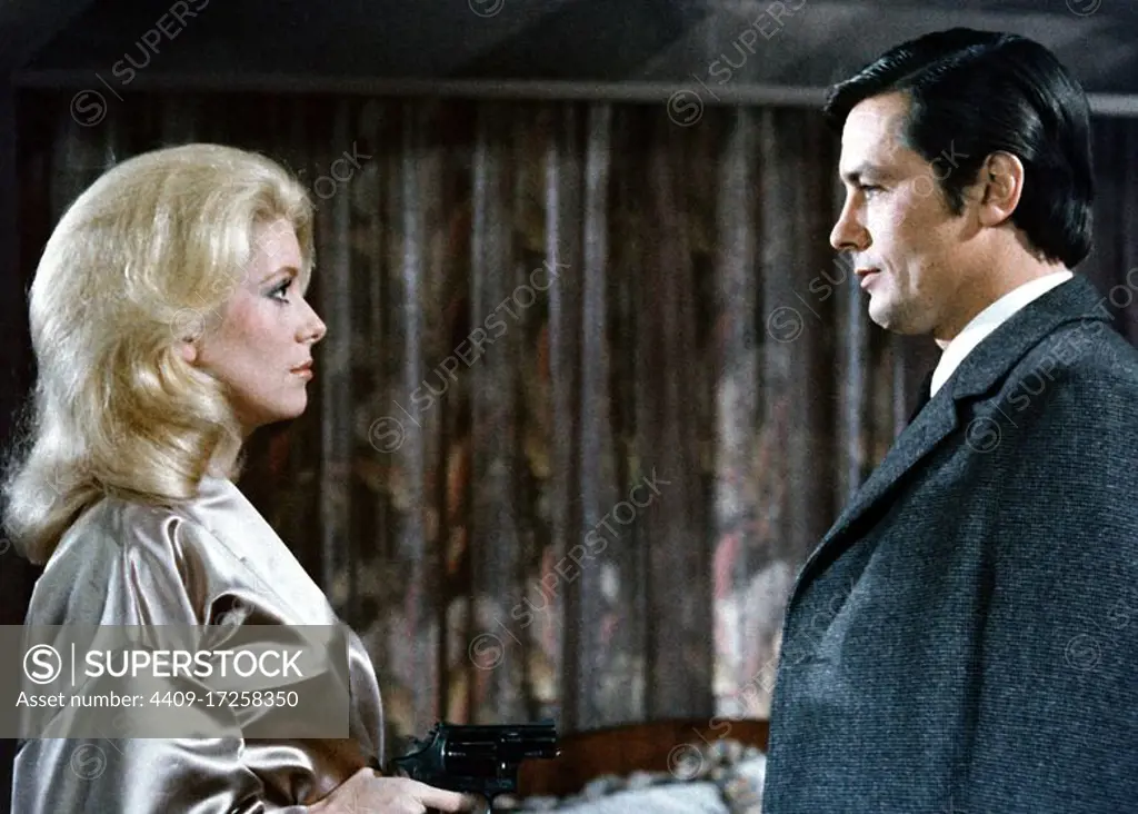 CATHERINE DENEUVE and ALAIN DELON in DIRTY MONEY (1972) -Original title: UN FLIC-, directed by JEAN-PIERRE MELVILLE.