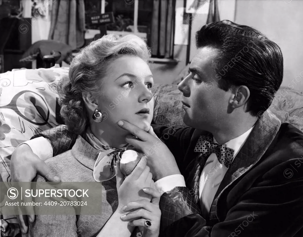 DIRK BOGARDE and SUZANNE CLOUTIER in DOCTOR IN THE HOUSE (1954), directed by RALPH THOMAS.