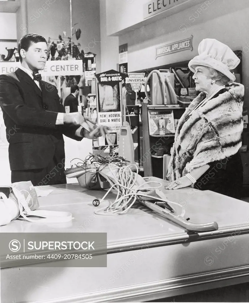 JERRY LEWIS and ISOBEL ELSOM in WHO'S MINDING THE STORE (1963), directed by FRANK TASHLIN.