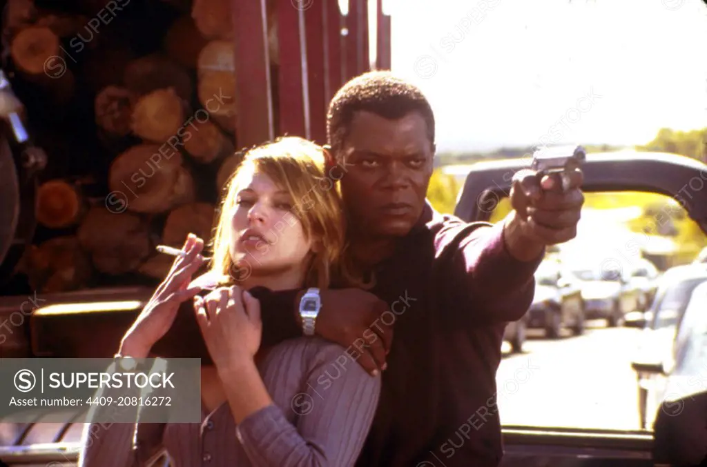 SAMUEL L. JACKSON and MILLA JOVOVICH in NO GOOD DEED (2002), directed by BOB RAFELSON.