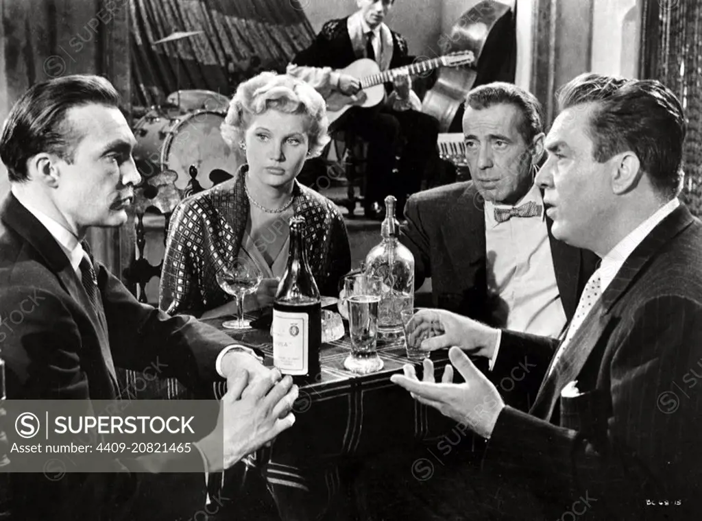 HUMPHREY BOGART, EDMOND O'BRIEN and WARREN STEVENS in THE BAREFOOT CONTESSA (1954), directed by JOSEPH L. MANKIEWICZ.