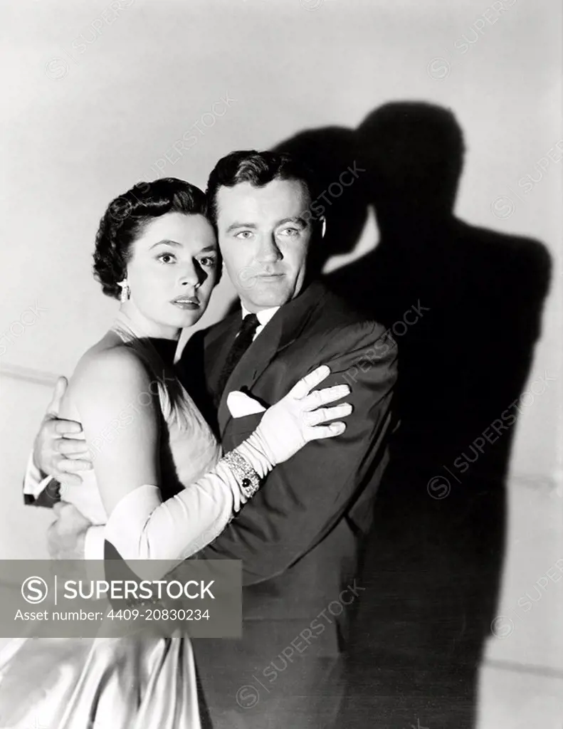 ROBERT WALKER and RUTH ROMAN in STRANGERS ON A TRAIN (1951), directed by ALFRED HITCHCOCK.