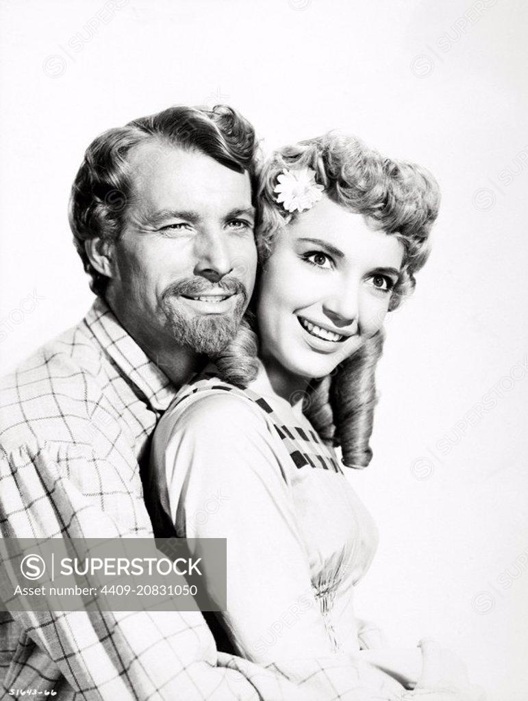 MATT MATTOX and RUTA LEE in SEVEN BRIDES FOR SEVEN BROTHERS (1954),  directed by STANLEY DONEN. - SuperStock