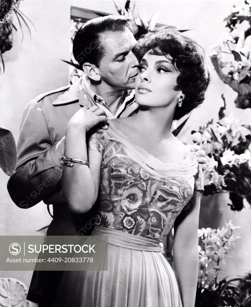 FRANK SINATRA and GINA LOLLOBRIGIDA in NEVER SO FEW (1959), directed by JOHN STURGES.