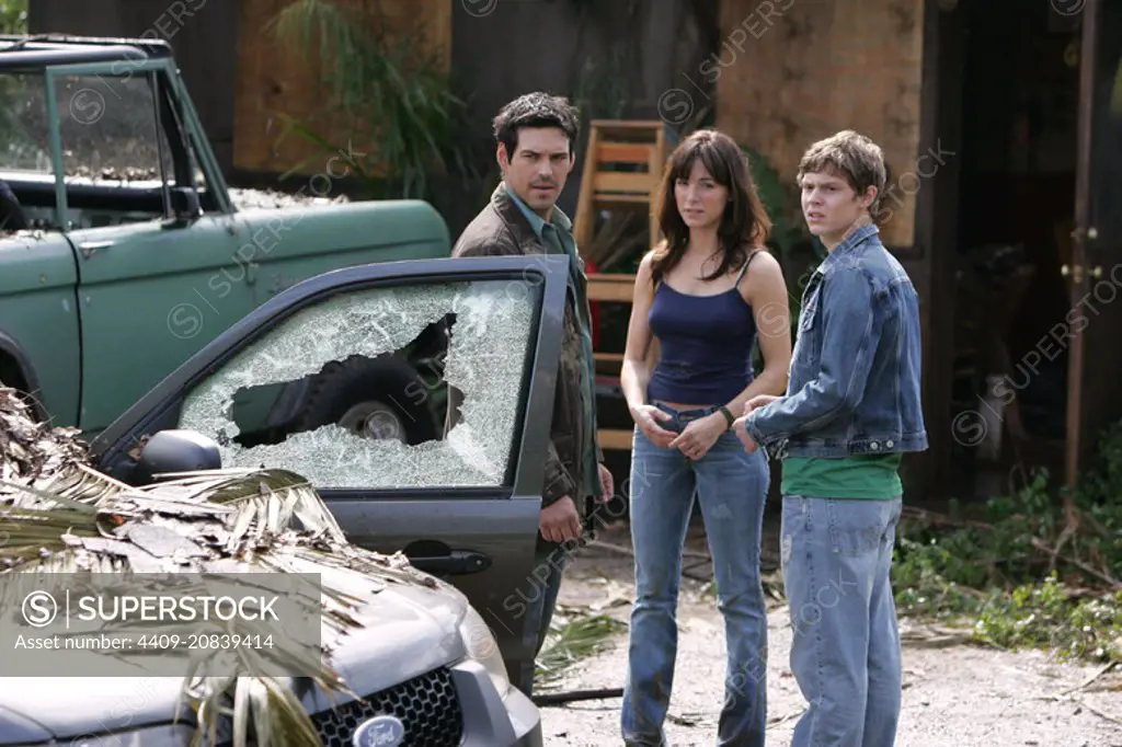 EVAN PETERS, EDDIE CIBRIAN and LISA SHERIDAN in INVASION (2005) -Original title: INVASION-TV-, directed by SHAUN CASSIDY.