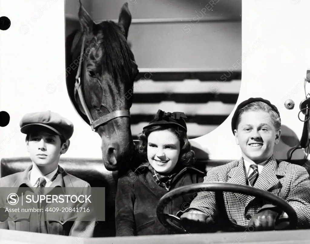 MICKEY ROONEY, JUDY GARLAND and RONALD SINCLAIR in THOROUGHBREDS DON'T CRY (1937), directed by ALFRED E. GREEN.