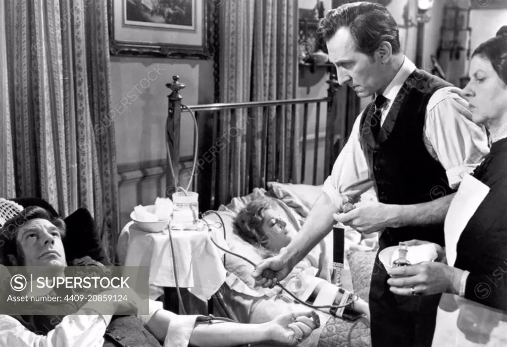 MICHAEL GOUGH, PETER CUSHING and VALERIE GAUNT in DRACULA (1958), directed by TERENCE FISHER.