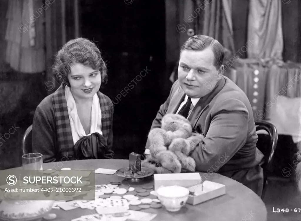 ROSCOE "FATTY" ARBUCKLE and BETTY ROSS CLARKE in TRAVELING SALESMAN (1921), directed by JOSEPH HENABERY.