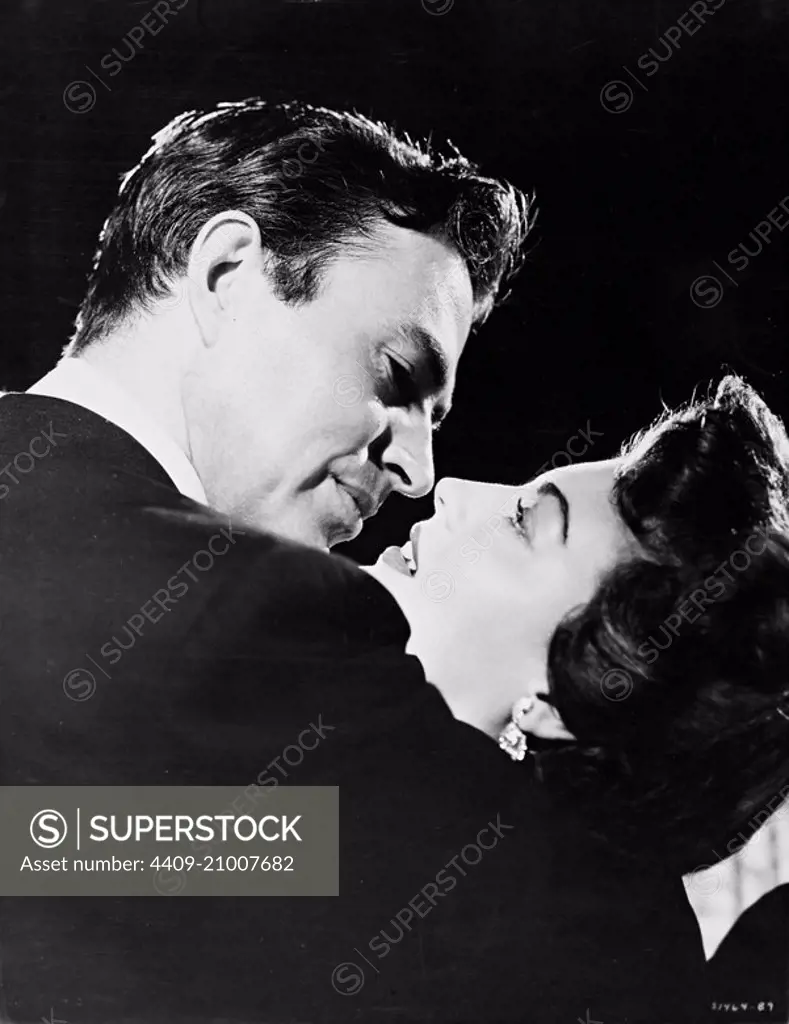 JAMES MASON and AVA GARDNER in EAST SIDE, WEST SIDE (1949), directed by  MERVYN LEROY. - SuperStock