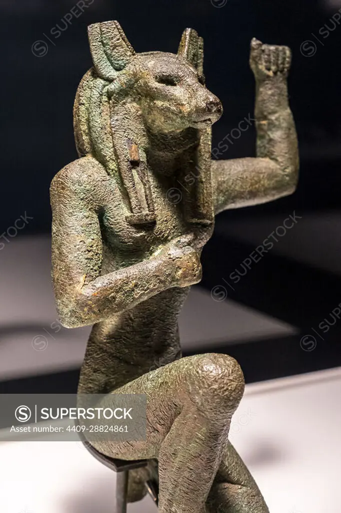 Jackal-headed Horus of Nekhen, from Upper Egypt, statuette in attitude of jubilance, bronze, late period, 664-332 BC, Egypt, collection of the British Museum.