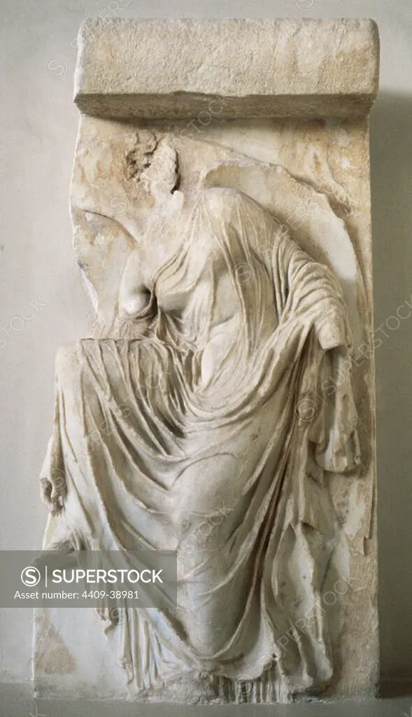 Relief depicting Nike or Victory tie his sandals. Bastion of the Temple of Athena Nike, by Phidias (c.432-490 BC). 427-424 BC. Acropolis Museum. Athens. Greece.