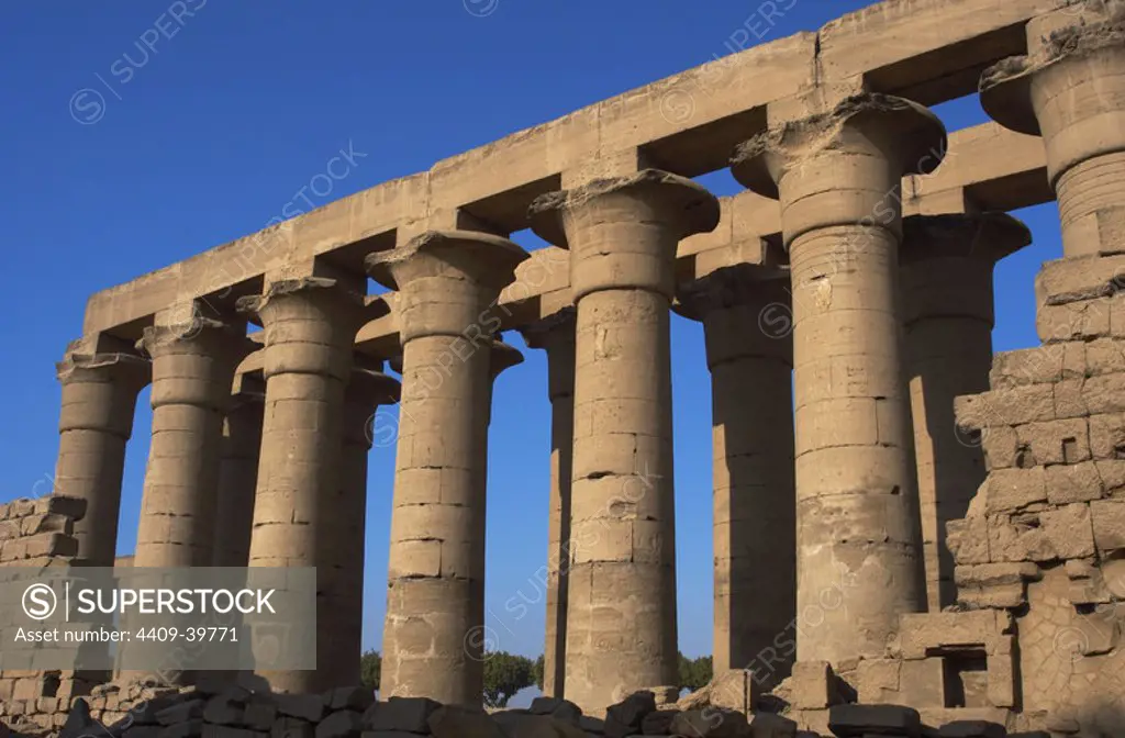 Temple of Luxor. Colonnade with two rows of seven smooth shaft campaniform columns. New Empire. Egypt.