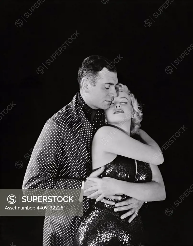 MARILYN MONROE and LAURENCE OLIVIER in THE PRINCE AND THE SHOWGIRL (1957), directed by LAURENCE OLIVIER.