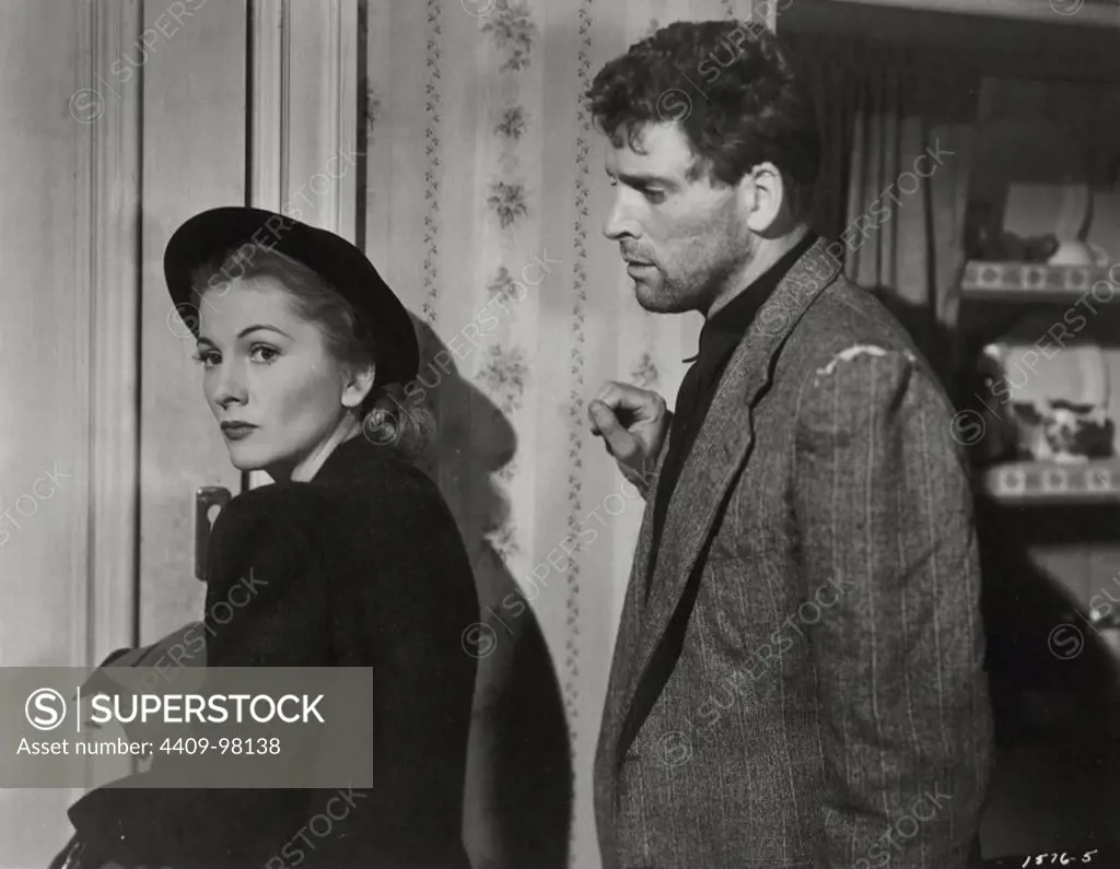 JOAN FONTAINE and BURT LANCASTER in KISS THE BLOOD ON MY HANDS (1948), directed by NORMAN FOSTER.