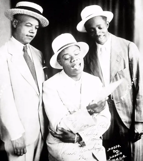 Louis Armstrong con Little Joe Lindsay y Sherman Cook. New Orleans, 1931.