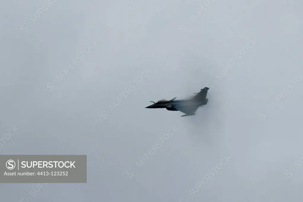 Plane crossing the sound barrier