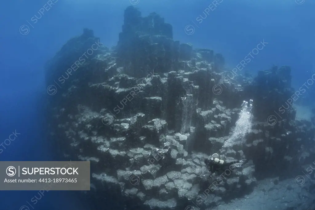 Volcanic underwater bottoms, Tenerife. A mountain made of basaltic columns (columnar disjunction) is observed. Seabed of the Canary Islands.