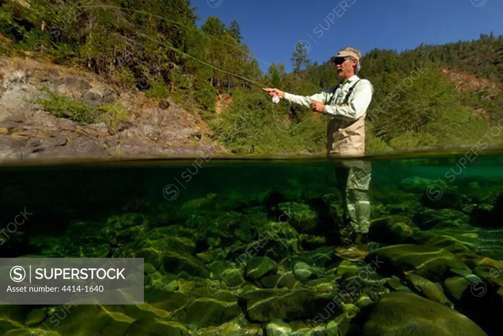 USA, California, Smith River National Recreation Area, Smith River, Elder man flyfishing