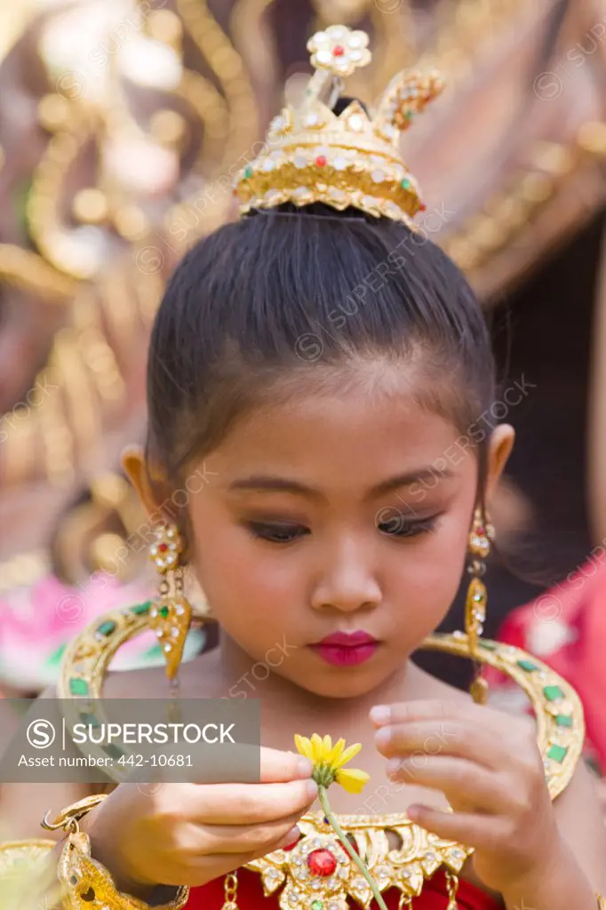 Asia,Thailand,Northern Thailand,Chiang Mai,Chiang Mai Flower Festival,Festival,Festivals,Parade,Street Parade,Tradition,Thais,Thai Girl,Thai Girls,Girl,Child,Children,Female,Portrait,Oriental Face,Asian Face,Costume,Traditional Costume,Thai Costume,Holiday,Vacation,Tourism,Travel