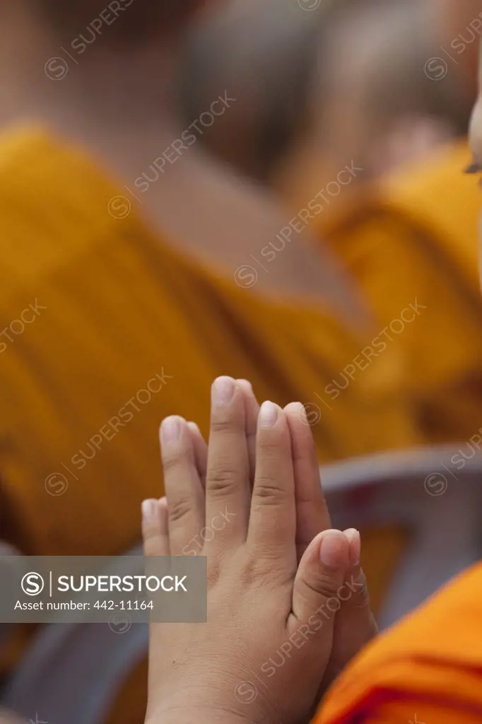 Close-up of a monk praying, Ayutthaya Historical Park, Ayutthaya, Thailand