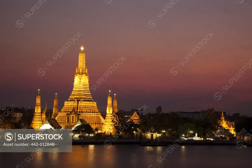 Temple at the waterfront, Wat Arun, Chao Phraya River, Bangkok, Thailand