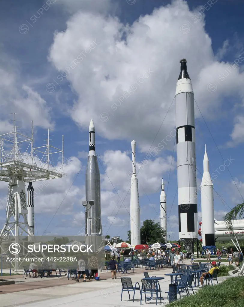 Tourists at a rocket garden, Kennedy Space Center, Cape Canaveral, Florida, USA