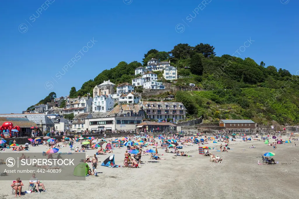 Tourists on the beach, Looe Beach, Looe, Cornwall, England