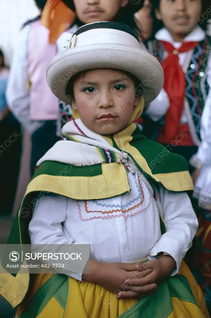 Portrait of a girl dressed in a traditional costume, Cuzco, Peru