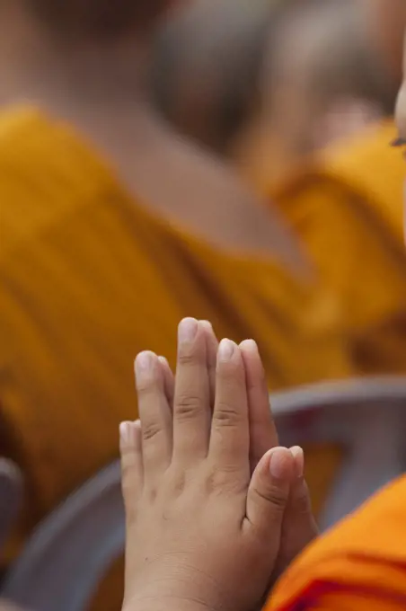 Close-up of a monk praying, Ayutthaya Historical Park, Ayutthaya, Thailand