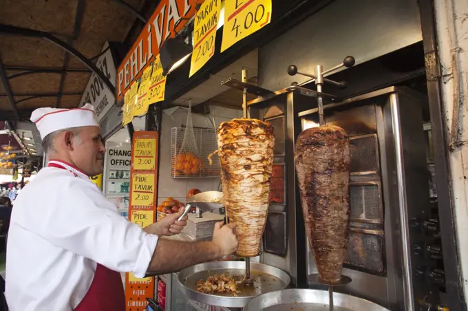 Man cooking kebab in a restaurant, Istanbul, Turkey