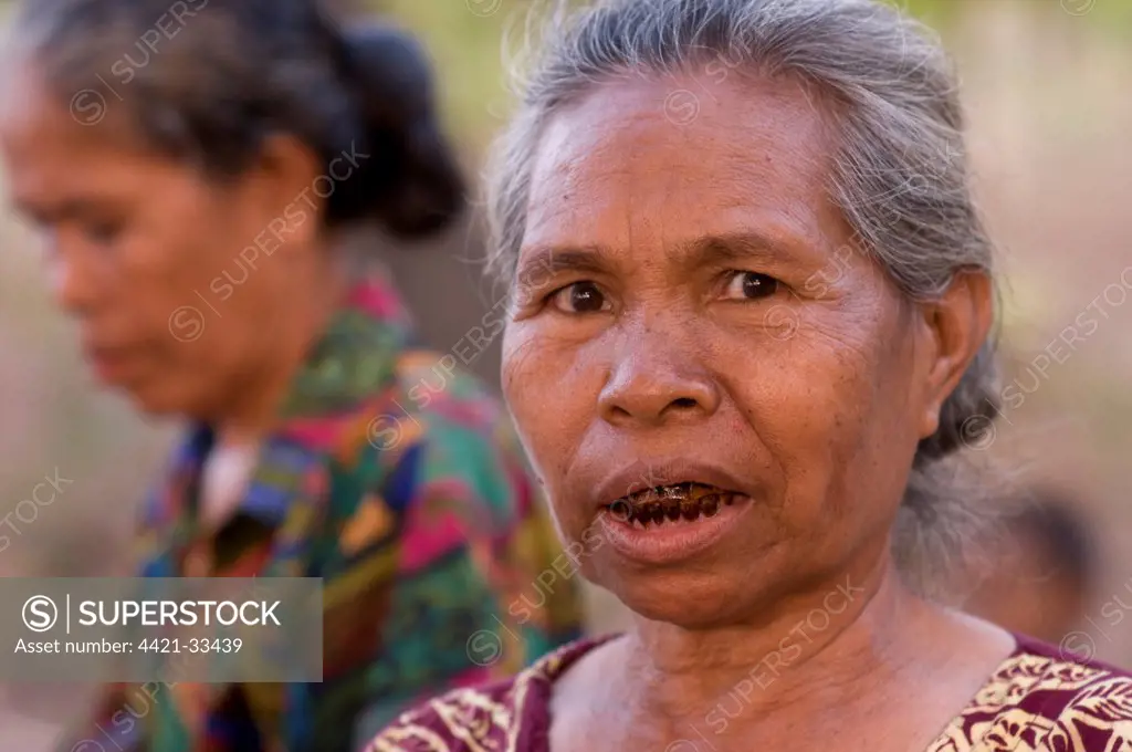 Old woman with betel stained teeth, Lewaling Village, Lembata Island, Solor Archipelago, Lesser Sunda Islands, Indonesia