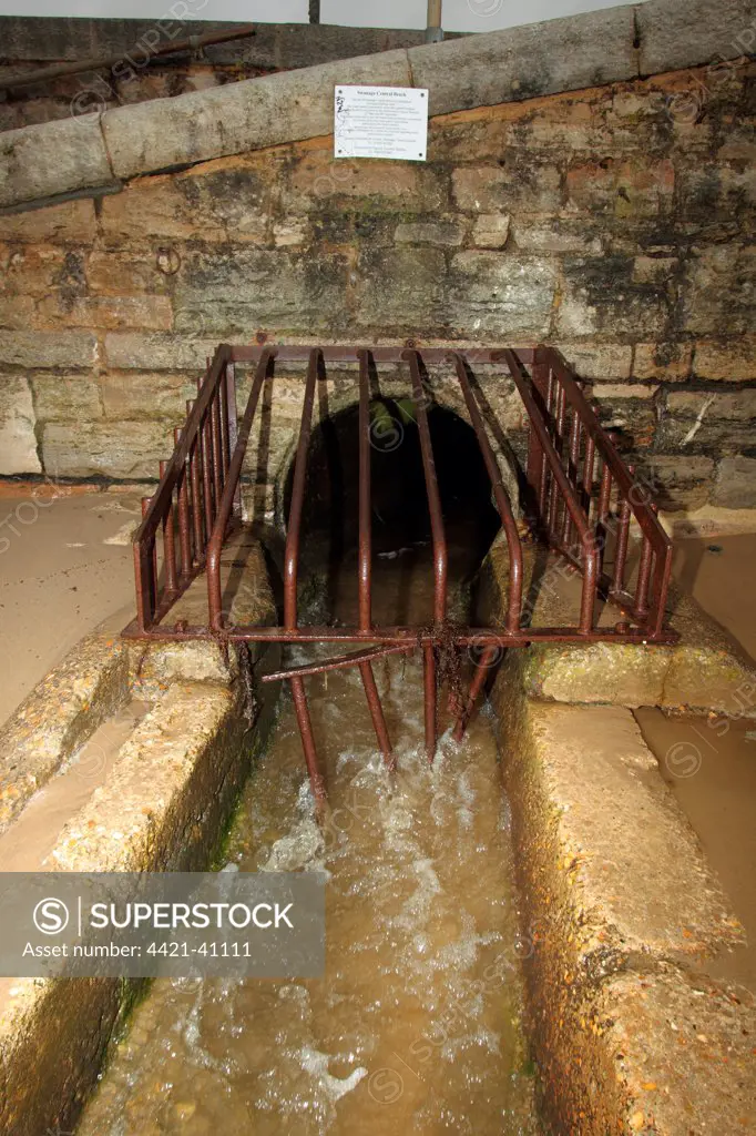 Combined sewer overflow (CSO), sanitary sewage and stormwater runoff discharged onto beach, Swanage Central Beach, Swanage, Dorset, England, april