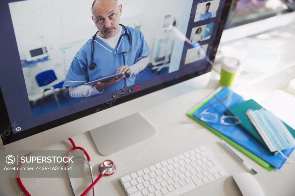 Doctors video conferencing on computer screen