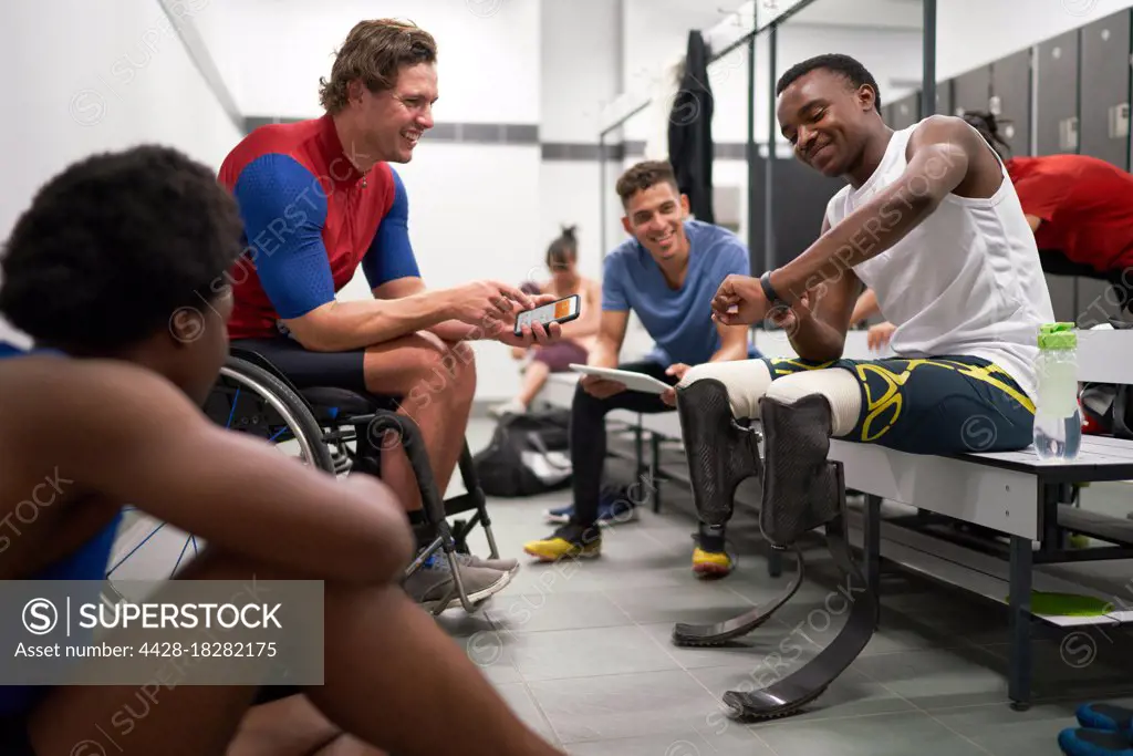 Amputee and wheelchair athletes in locker room