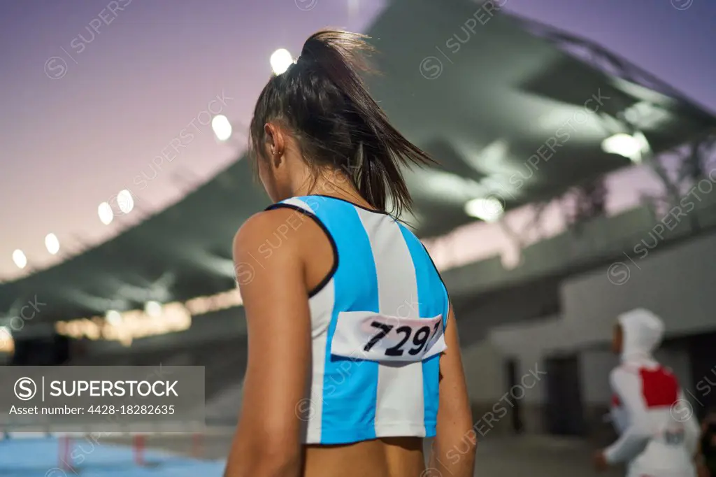 Female track and field athlete preparing for competition