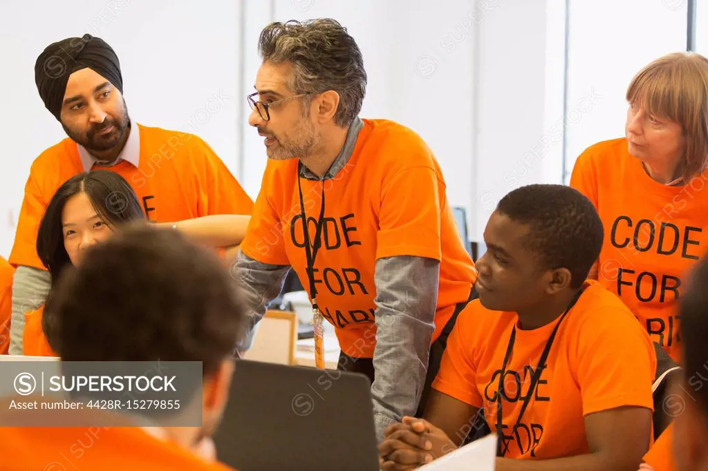 Hackers coding for charity at hackathon