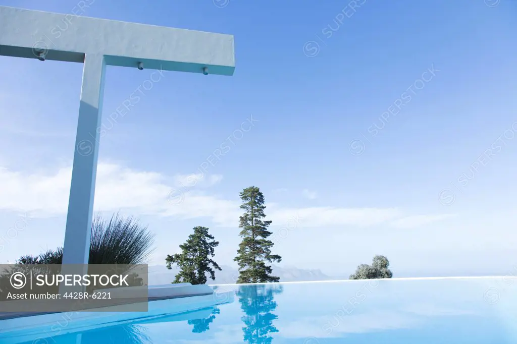 Trees and shower overlooking infinity pool