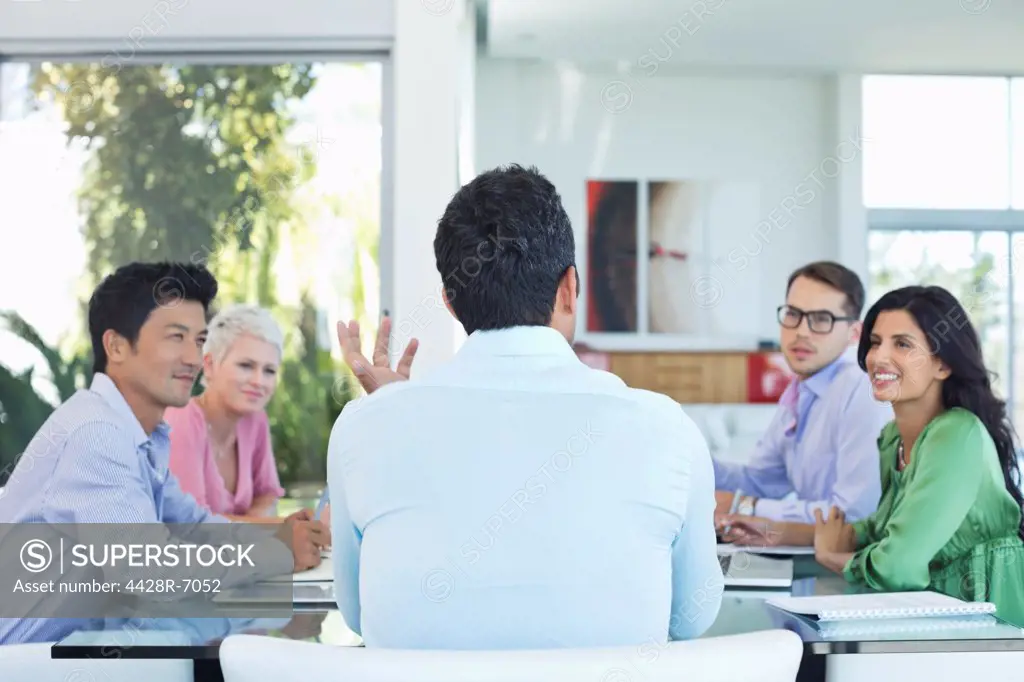 Business people talking in meeting