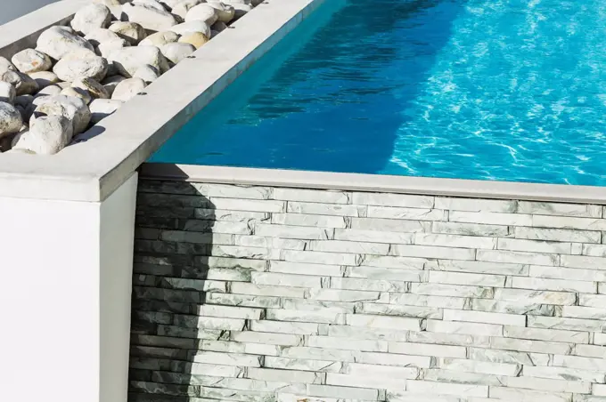 Rocks and wall around lap pool