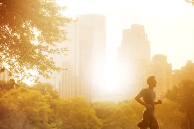 Man running in urban park,New York