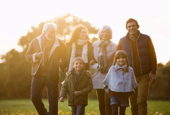 Family walking together in park,London, UK