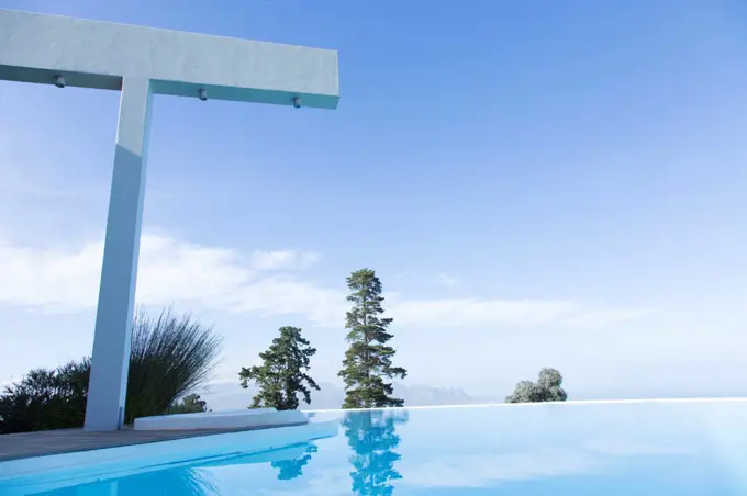 Trees and shower overlooking infinity pool