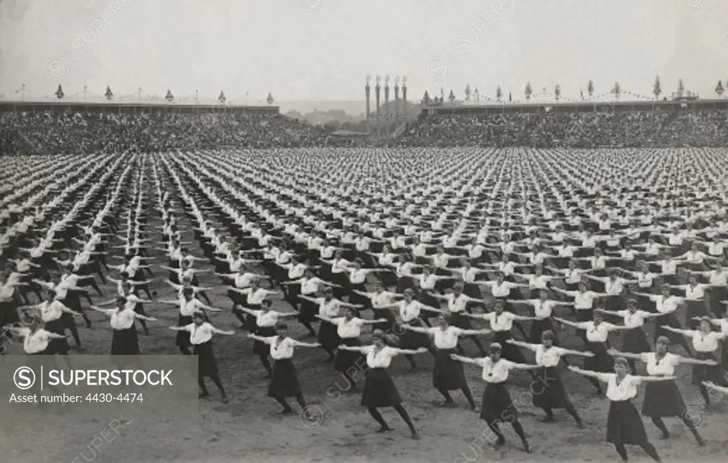 sport physical education gymnastics female athletes during a performance circa 1910 ,20th century,