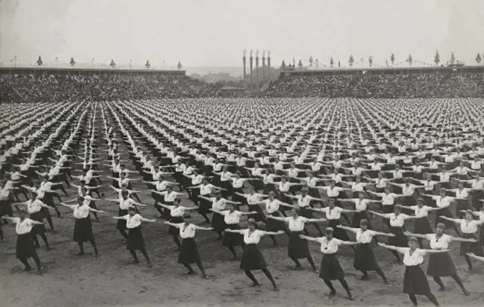 sport physical education gymnastics female athletes during a performance circa 1910 ,20th century,