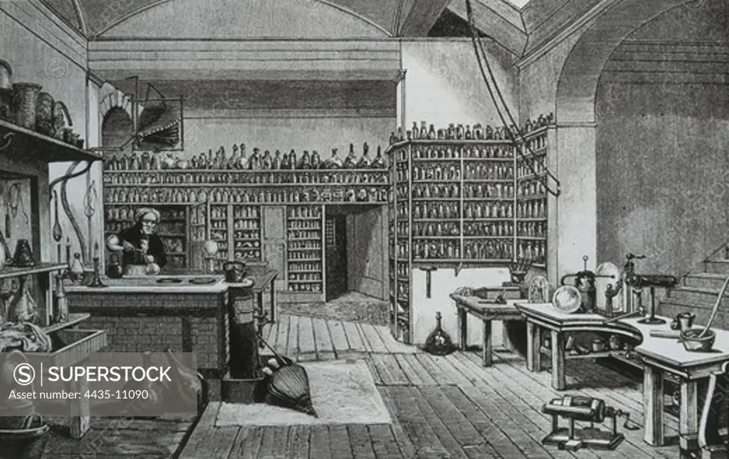 FARADAY, Michael (1791-1867). British chemist and physicist. Faraday in his laboratory. Painting. UNITED KINGDOM. ENGLAND. London. The British Museum.