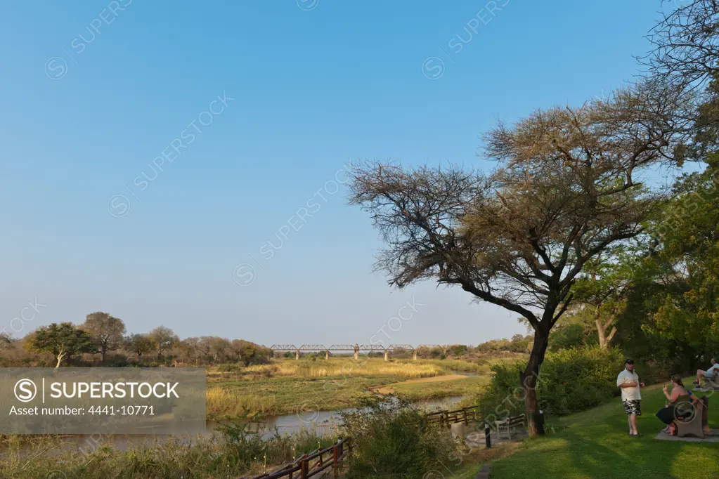 View of Sabi (Sabie) River at Skukuza Camp showing the Selati Railway Bridge which crosses the Sabie River. Kruger National Park. Mpumalanga. South Africa.