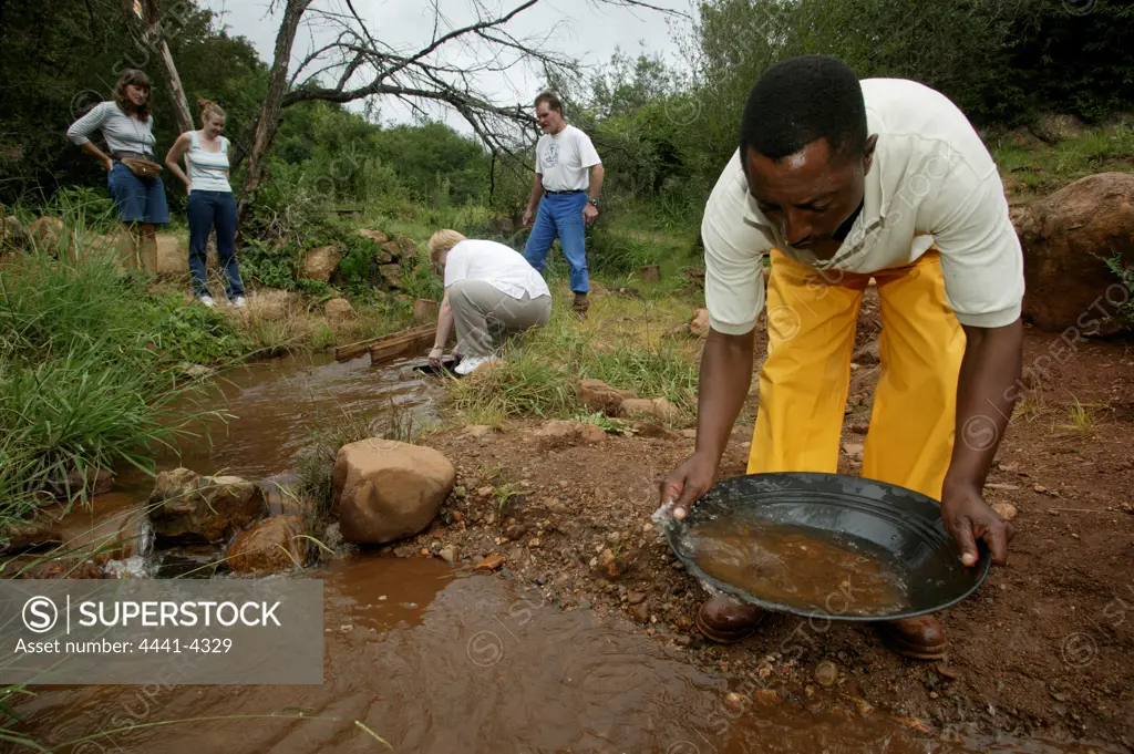 Tourists panning for gold. Pilgrims Rest. Mpumalanga. South Africa