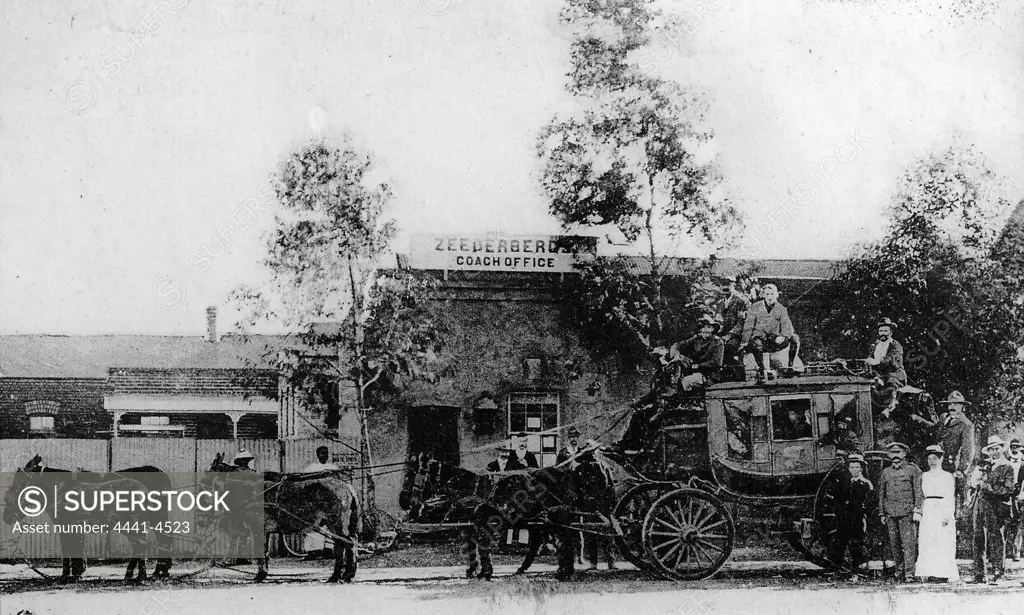 A  Zeederberg coach outside the Company's office in Pretoria.  South Africa. It shows Percy Fitzpatrick and his dog and then Rider Haggard behind them. There seems to be some dispute that Jock, of 'Jock of the Bushveld' fame ever existed.