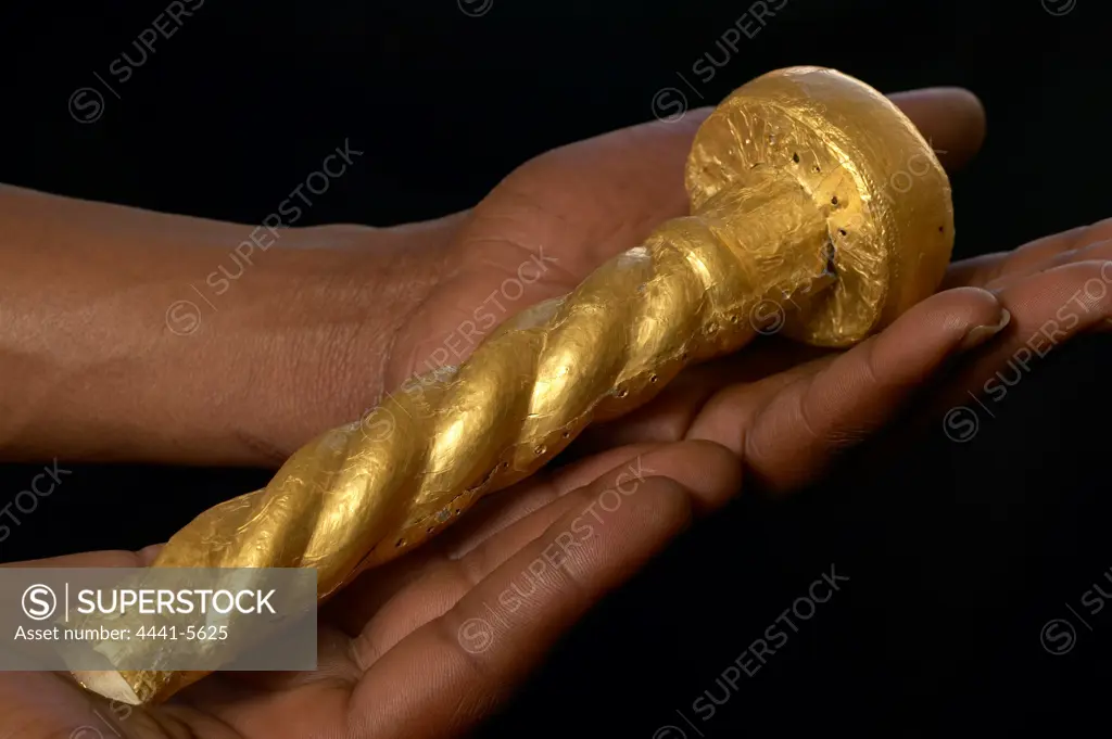 Gold Sceptre (21mm in length and weighing 27g). Recovered from Mapungubwe Hill. Northern Province. South Africa.  Photographed at the Mapungubwe Museum. University of Pretoria.